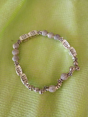Grey bracelet with assorted beads