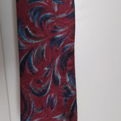 Canda tie used in red and blue shades