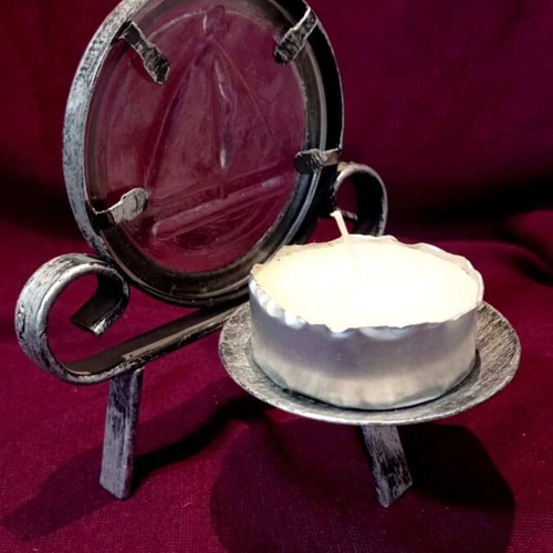 Metal tealight holder like new with glass sailboat decoration