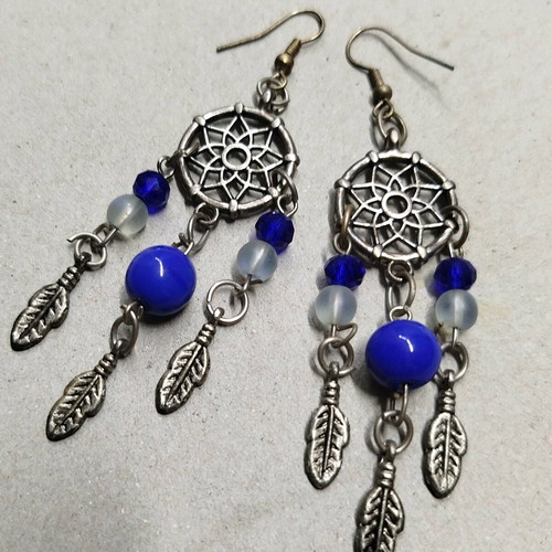 Earrings new with blue beads and feather charms