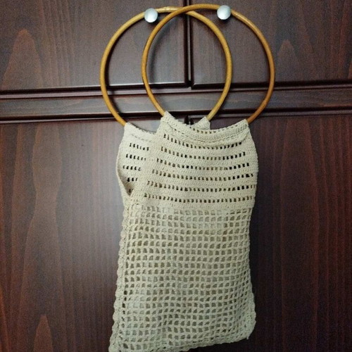 Knitted shoulder bag with ring handles beige like new