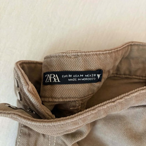 Zara women's beige pants size M like new with minor seam damage