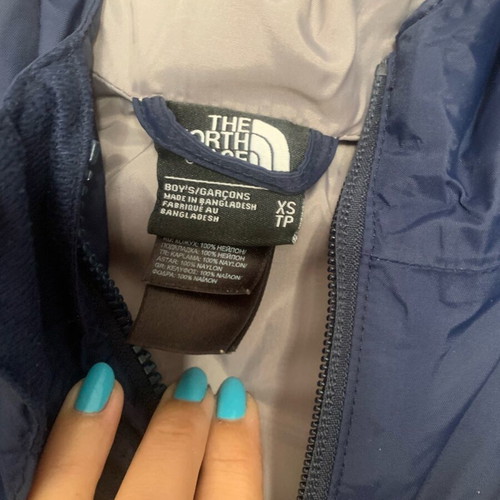 The North Face Kids Windbreaker used, size XS, blue