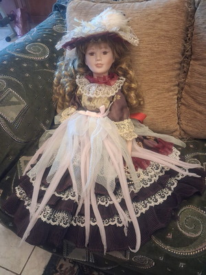 Vintage porcelain doll 55 cm used with lace and feathers