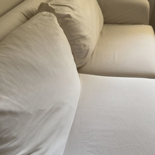 Three-seater sofa with solid wood frame