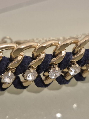 Women's bracelet with gold chain, rhinestones & woven cord