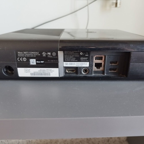Xbox 360 E used console with power cable, disc tray issue