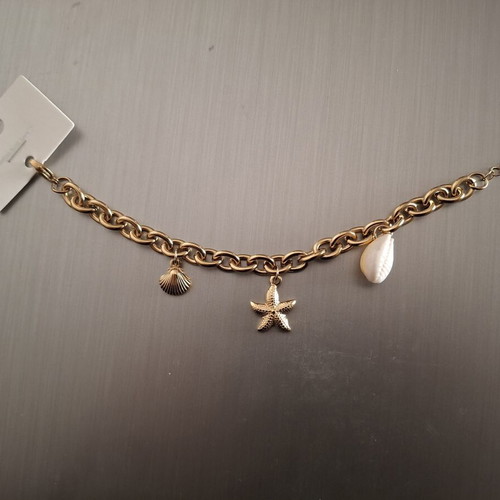 Stainless steel bracelet with gold-colored charms, new