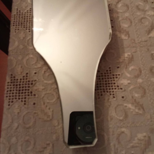 Mirror with pebble decoration