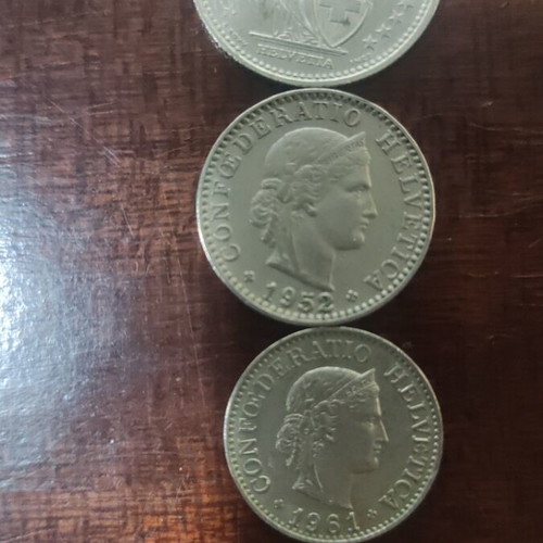 Swiss coins like new, five-cent and 20 cent pieces