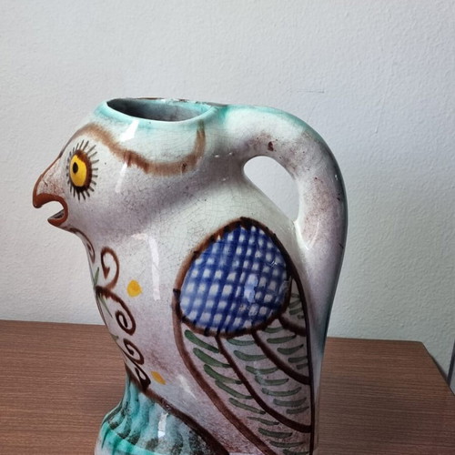 Ceramic owl pitcher used, broken and glued on the beak