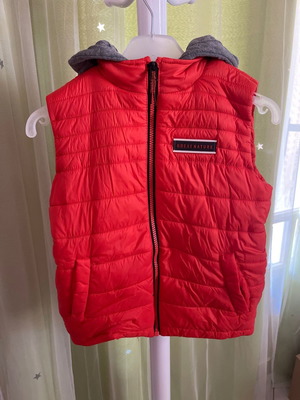 Sleeveless kids vest used, size 8-9 years, orange