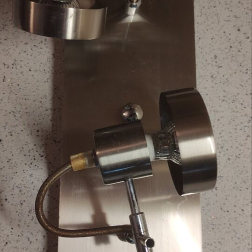 Ceiling light used with adjustable spotlights
