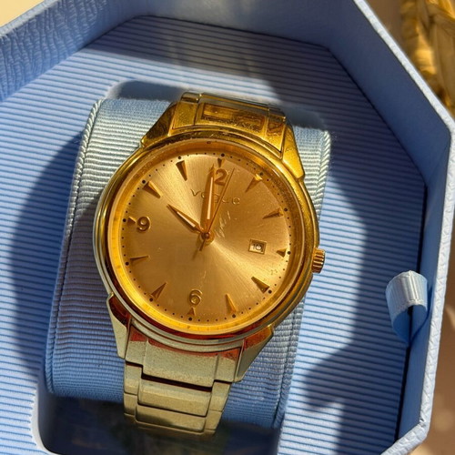 Vogue watch used, gold color with scratches