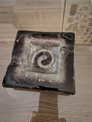 Handmade glass ashtray with black spiral motif