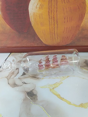 Decorative ship in glass bottle new