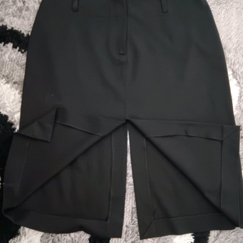 Black skirt knee-length with slit, like new