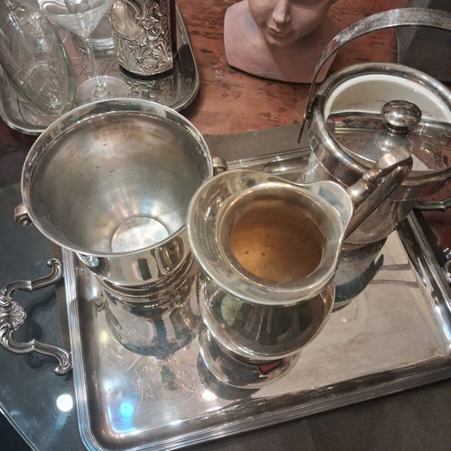 Silver-plated utensils used, set with Christofle tray and Lampidis jug