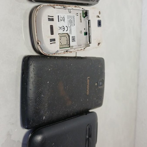 Old mobile phones used for spare parts, all together