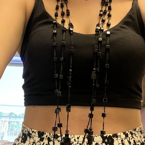 Long necklace used, black with diamond-like beads