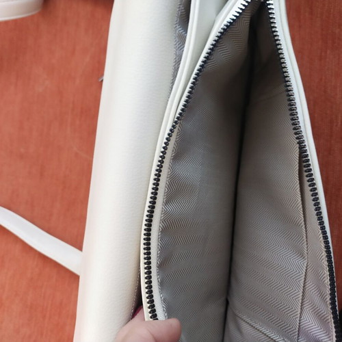 Women's bag new, adjustable strap, white-cream color, zip pockets