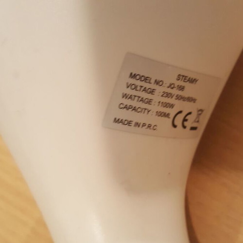 Steamy handheld steam device like new for clothes and curtains