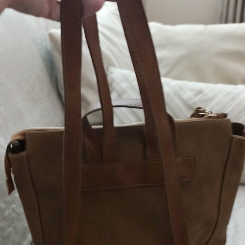Thiros backpack in brown color like new