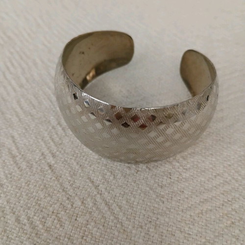 Vintage cuff bracelets like new, embossed geometric and floral design, set of 2