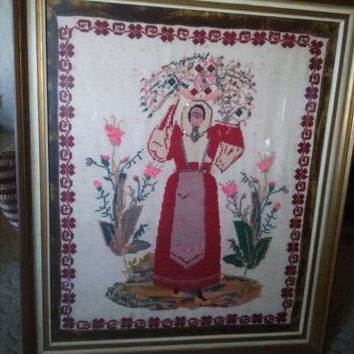 Antique embroidery used with girl and umbrella on canvas