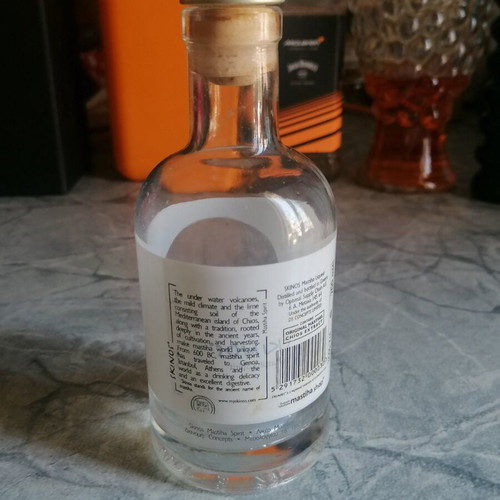 Decorative empty Skinos mastiha bottle used