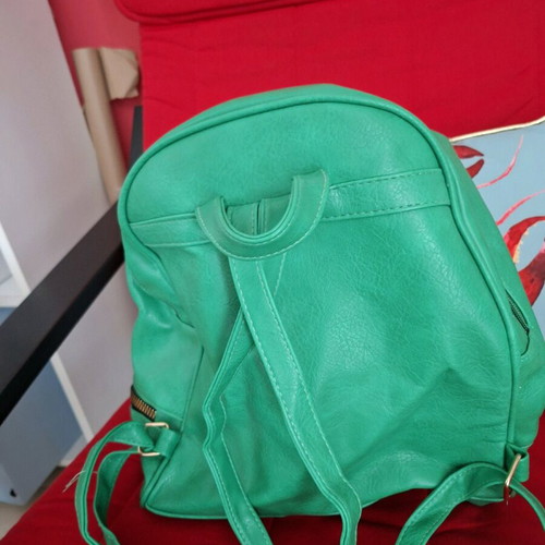 Green leather backpack new with spacious compartments