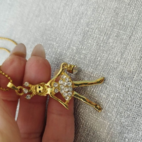 Pendant necklace gold with ballerina and white crystals and hanging stone