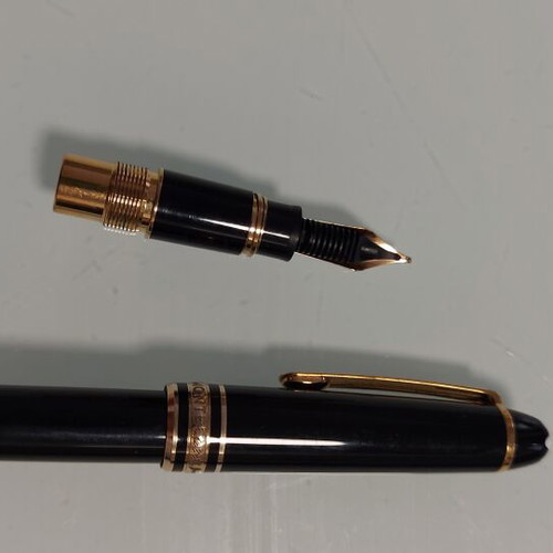 Mont Blanc Meisterstuck mini sized baby fountain pen with 14k gold nib and Mont Blanc men's lapel pin gift