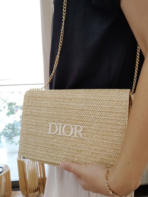 Dior Beauty collectible straw pochette with extra chain and two Dior products