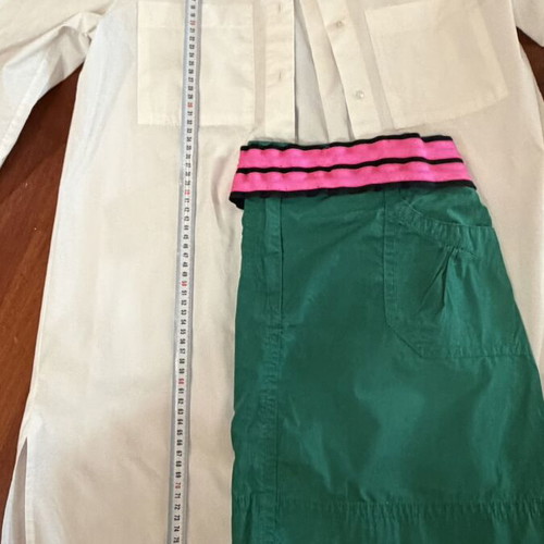 Set of 3 pieces like new, white semize shirt with letters, green skirt, fuchsia belt