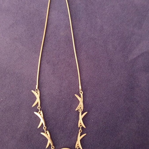 Jewelry set new, gold tone with unique design
