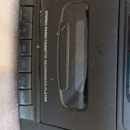 Radio cassette player CD used with battery operation and CD door issue