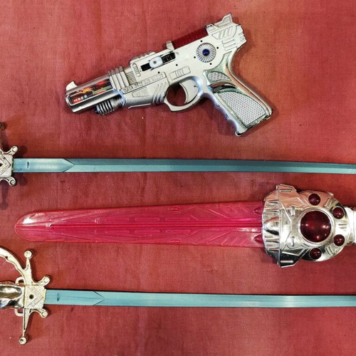 Toys used, space gun and swords with batteries