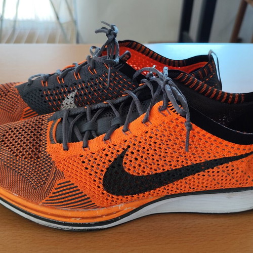 Nike Flyknit Racer men's athletic shoes size 47.5, like new, orange and grey