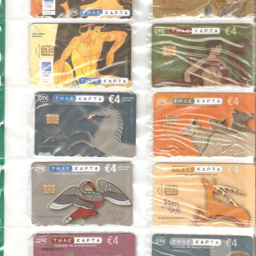 Collection of used 2307 phone cards with holders