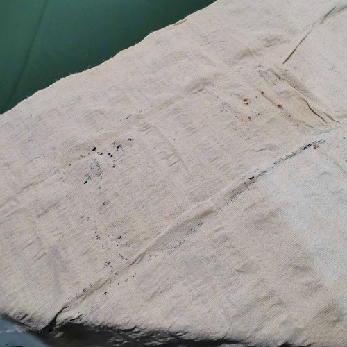 Wool woven bed sheet used with stain and wear from 1930 era