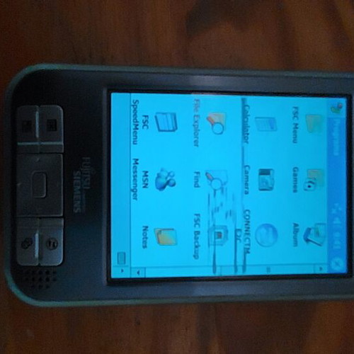Fujitsu Siemens Pocket LOOX 720 PDA used with GPS tracker and accessories