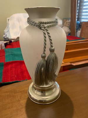 Glass vase used with silver rope and silver-plated details