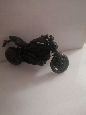 Ducati plastic motorcycle used, does not stand upright
