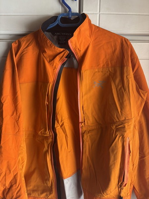 Arcteryx men's vintage orange jacket XL used with pocket defect
