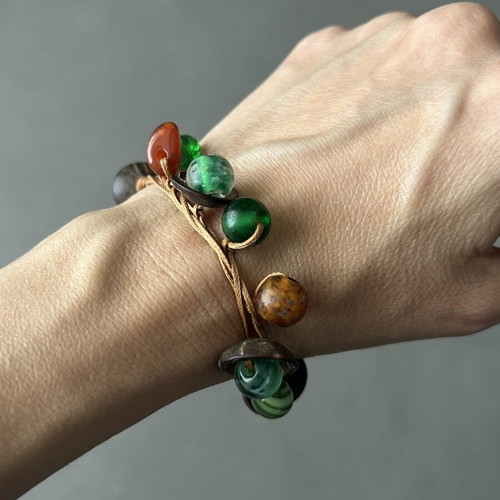 Handmade bracelet with colorful glass beads on cord like new