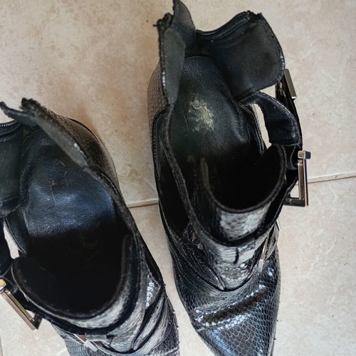 Black boots size 38 used with slight sole peeling inside