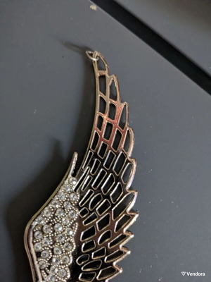 Angel wing like new, gold with rhinestones statement piece