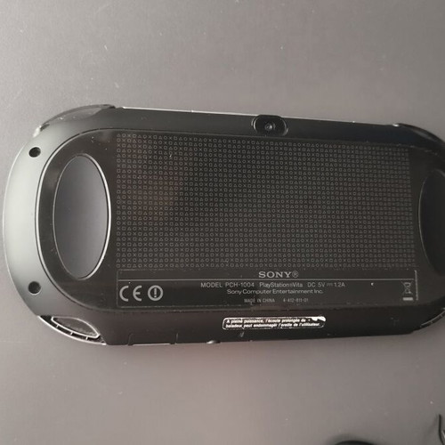 Sony PlayStation Vita PCH-1004 OLED used with memory and USB charger