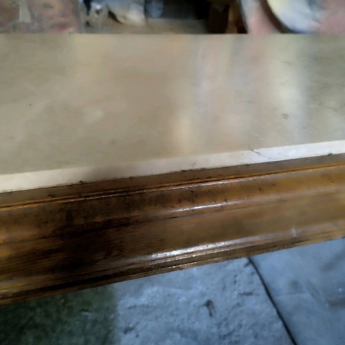 Coffee table with wooden base and marble top used